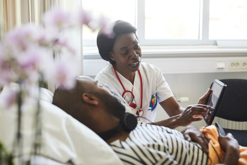 A doctor talking to her patient about Nerve Stim Implants.